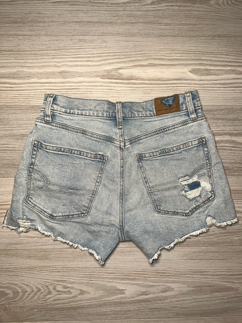 American Eagle Outfitters
Light Blue Distressed Denim Shorts - Size 2 - Picture 3 of 12